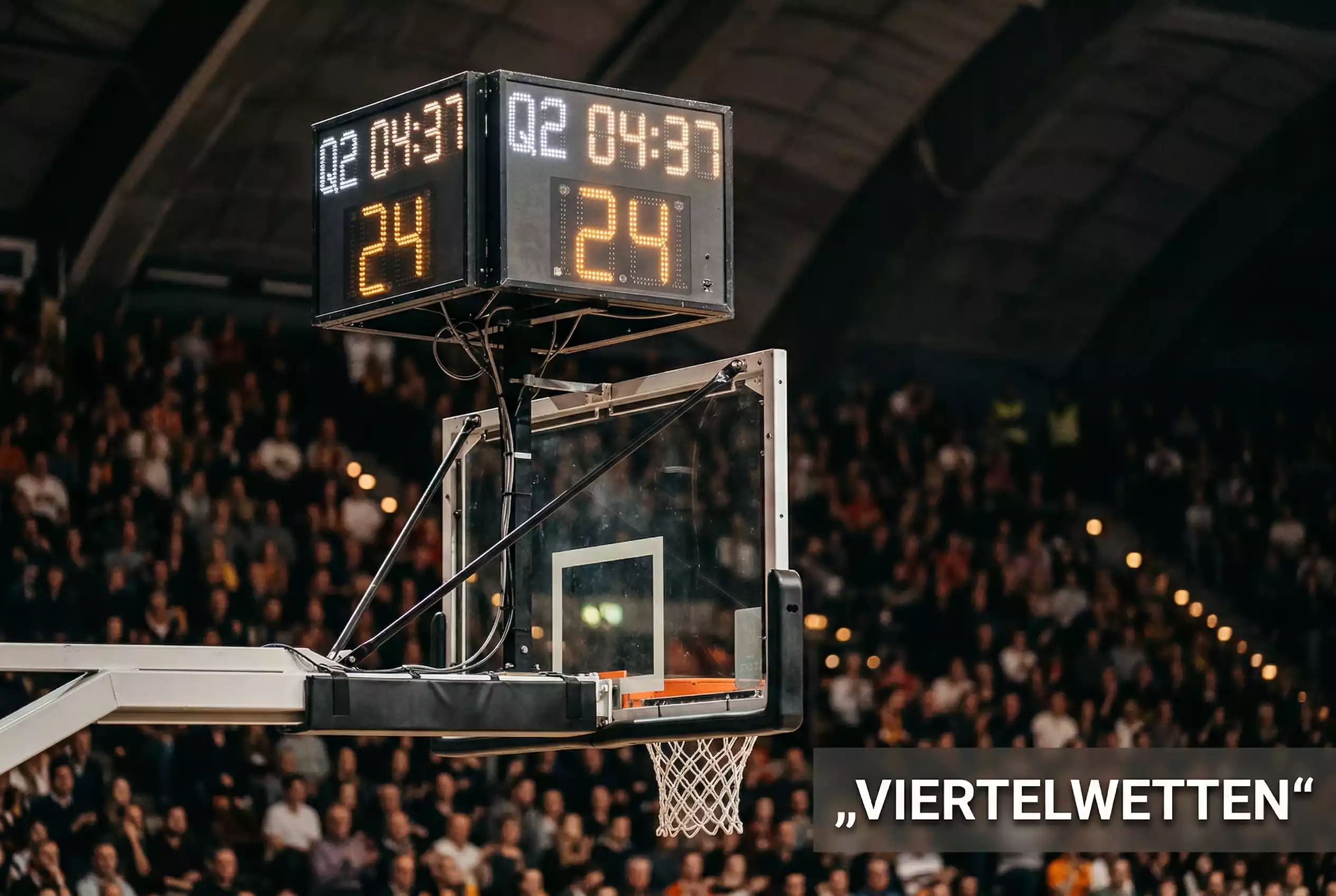 Basketball Viertelwetten – Nahaufnahme einer Spieluhr-Anzeige mit Viertelstand in einer Basketball-Halle